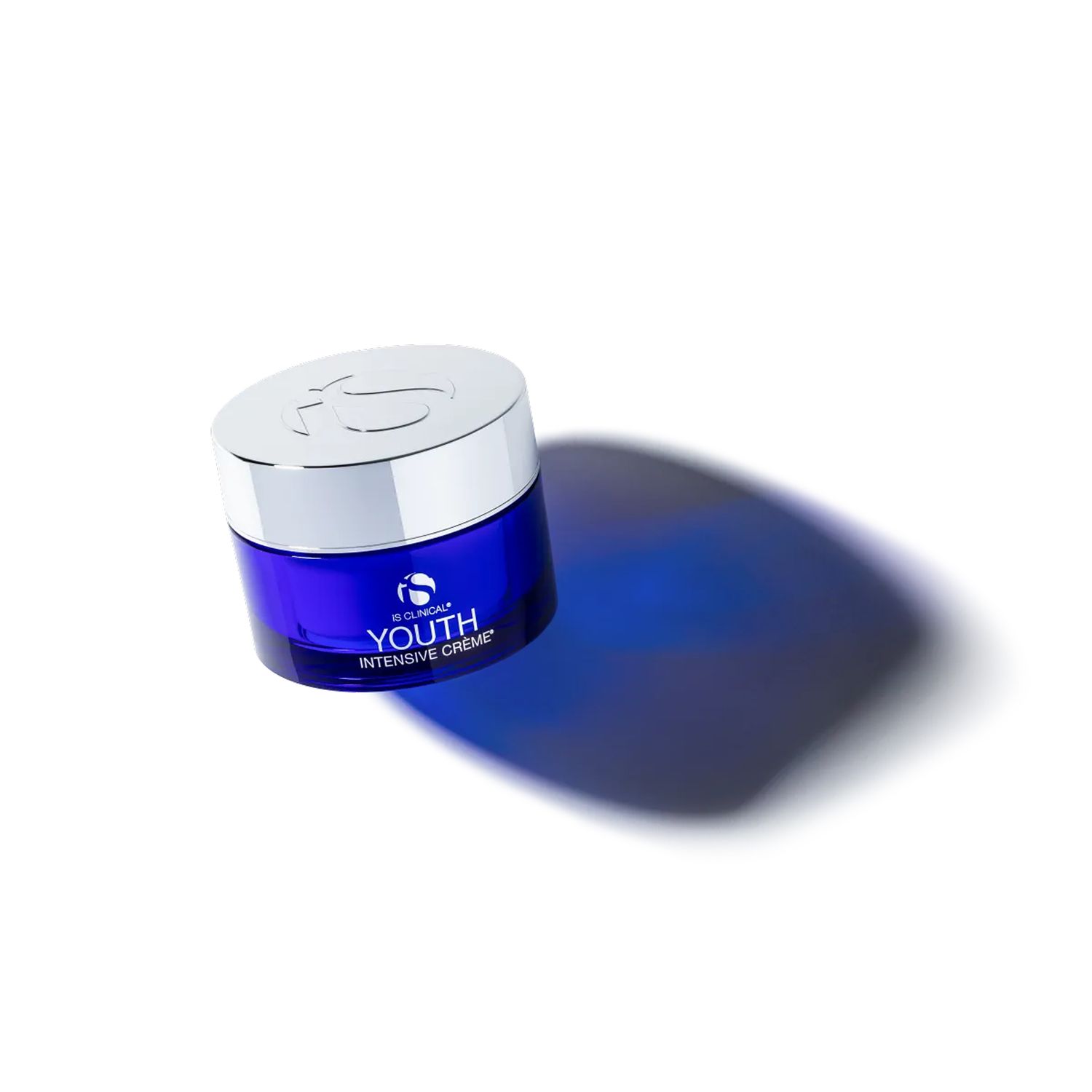 Youth intensive cream in blue jar with shadow.