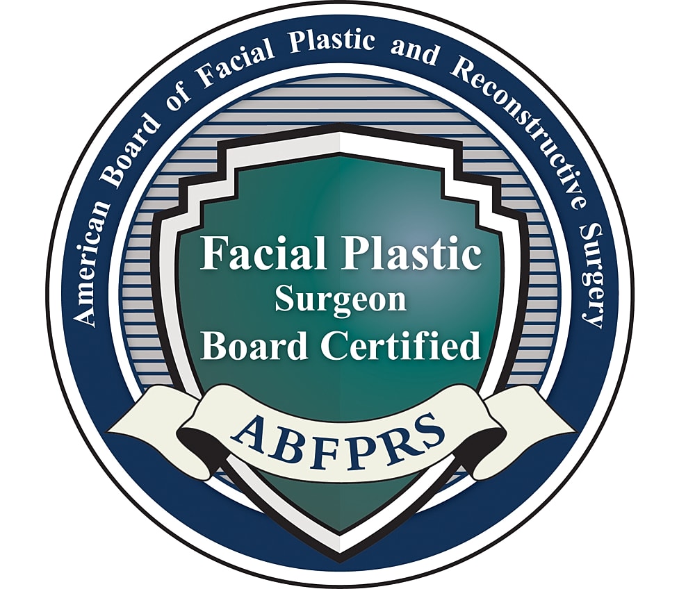 Board certification emblem for facial plastic surgery.